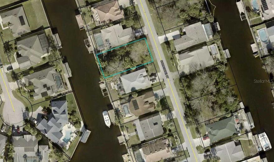 Beautiful 60 x 125 lot in Sailboat Country on a Saltwater Canal.  Only minutes to the Intracoastal waterway.  Property already has a Sea Wall in place and some mature palms.  No fixed bridges to the Intracoastal Waterway.  Drive by and discover the possibilities for your new home.  Plans available to fit this lot with SeaGate Homes.