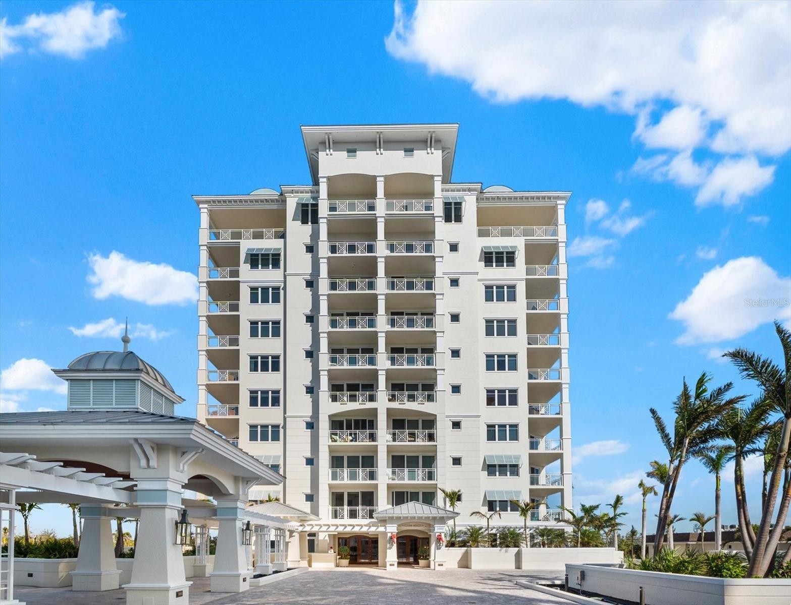 Under contract-accepting backup offers. Price Improvement! Experience refined coastal living at Orchid Beach Club, a prestigious community on the southern end of Lido Key. This elegantly designed residence offers 2,936 square feet of sophisticated beachfront living, featuring three en-suite bedrooms, spacious walk-in closets, and expansive terraces that seamlessly blend indoor and outdoor spaces. The primary suite is a true retreat, complete with private terrace access, spa-like bath with a glass-enclosed walk-in shower, soaking tub, bidet-equipped water closet, and dual vanities with a dedicated makeup area. The gourmet kitchen is perfect for both casual and formal gatherings, boasting a central island, gas cooktop, and charming breakfast nook. Designed with both luxury and practicality in mind, the home features a private elevator, soaring 11-foot ceilings, and custom finishes throughout. Elegant details such as crown molding, tile and wood flooring, and impact-rated windows and doors enhance both aesthetics and safety. Residents also enjoy the convenience of two designated under-building parking spaces and 24/7 gated security for ultimate peace of mind. Resort-Style Amenities include: State-of-the-art fitness center with sauna, steam room, massage room, beachside heated pool and spa with cabanas, a serene secret garden and dog run. The community spaces featuring a bar, catering kitchen, dining/conference room, game room, and library, two rentable guest suites for visitors and an on-site management for effortless living. This condo is ideally located near St. Armands Circle and just minutes from downtown Sarasota, Orchid Beach Club offers the perfect blend of luxurious beachfront tranquility and vibrant urban convenience. Don’t miss this incredible opportunity—schedule your private showing today!