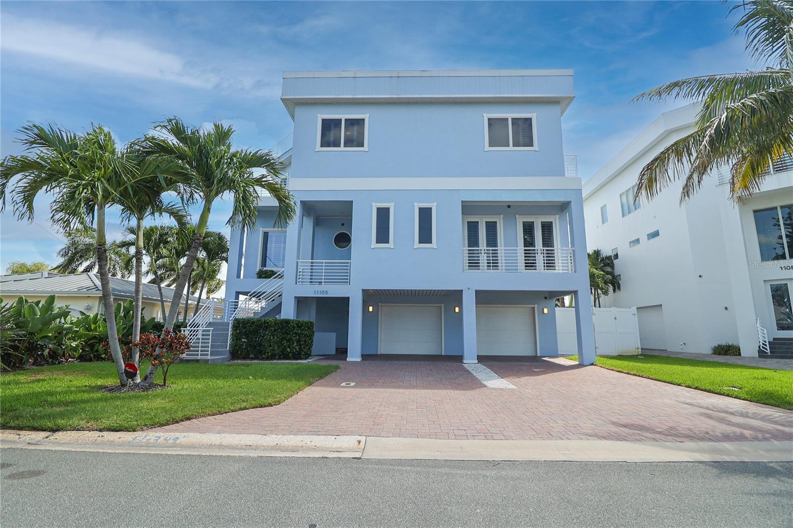 Boater’s & Entertainer’s Paradise! Waterfront Gem in Treasure Island, FL. Discover unparalleled luxury in this breathtaking waterfront home in the heart of Treasure Island, Florida. With captivating water views from every angle, this coastal masterpiece blends timeless elegance with modern flair, offering a lifestyle like no other.The heart of the home is a newly renovated kitchen that sets a new standard for luxury. Featuring a stunning floor-to-ceiling backsplash, a custom range hood, a Wolf gas range, and a Sub-Zero refrigerator, this space is as functional as it is beautiful. A massive island and a built-in bar with chilled drawers and a wine chiller make hosting effortless. Step onto the covered patio just off the kitchen to unwind with serene water views.Entertain in style in the formal dining room, adorned with exquisite woodwork and dazzling chandeliers. Need a quiet retreat? The versatile office/den delivers. The living room, with its soaring 30-foot ceilings, frames expansive water vistas, seamlessly connecting indoor luxury with outdoor beauty. An elevator ensures effortless access across the home.The primary suite is a haven of sophistication, featuring a custom walk-in closet and a spa-inspired bathroom that must be seen to be believed. Three additional bedrooms, two with private sunset-facing porches, offer comfort and charm.Outside, your private oasis awaits: a sparkling pool, a large dock with a 20,000-pound boat lift, jet ski lift, and space for a friend’s boat. Twin sundecks provide the perfect vantage point for both sunrise and sunset. Ample storage, generous closets, and an indoor laundry with cabinetry and sink add practicality to this dream home.This isn’t just a home—it’s your gateway to paradise. Don’t miss out on this Treasure Island treasure! Contact us to schedule your private tour today.