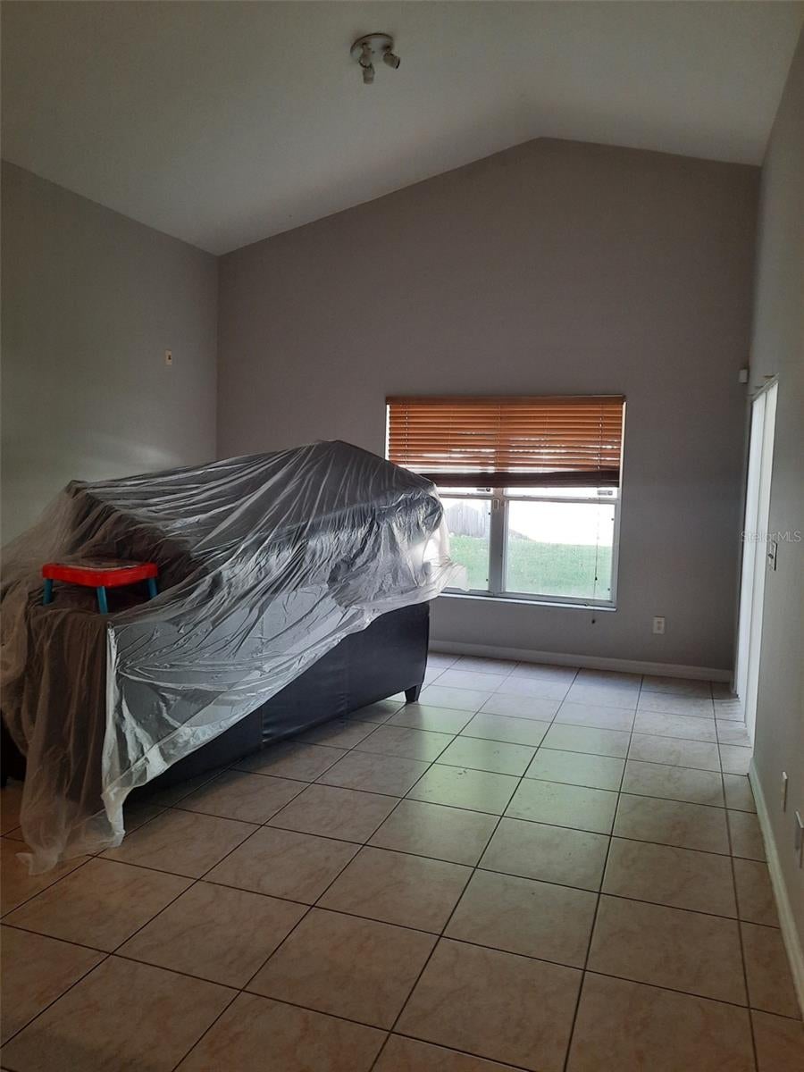 Photo of 12713 Winfield Scott Boulevard, Orlando, FL 32837 (MLS # O6413608)