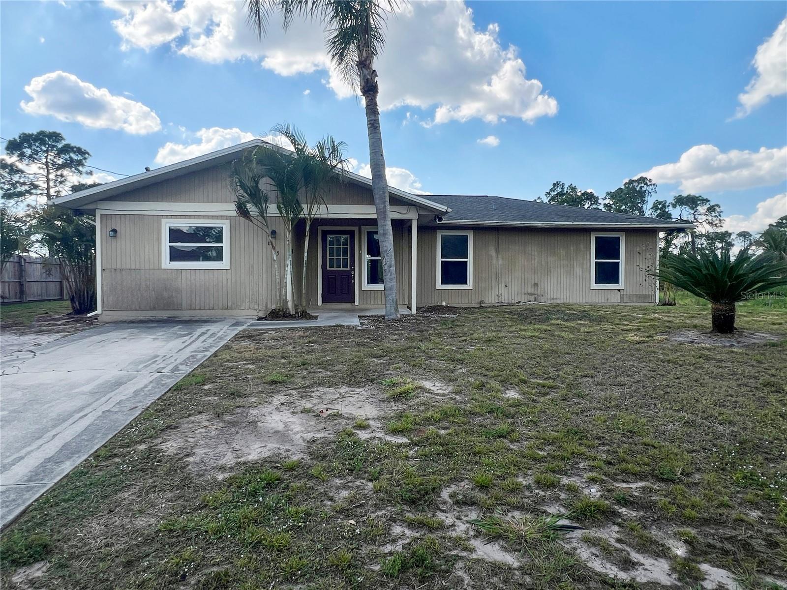PRICE REDUCTION! This home shows visually as 5B/2Ba but is a 3B/2Ba on public records. This property offers ample space for entertaining with 1,400 sqft inside and a large screened in pool area. The primary bedroom offers an additional living space leading out to the pool. The pool and spa area are surrounded by a large rock feature with lush landscaping. The pool also features a beach-entry area offering a great place to enjoy the view. The property also features a 2021 ROOF and NO FLOOD ZONE! 605 Leo Ave is located in Lehigh Acres, FL - centrally located to major roads, shopping, and dining. Don't miss your opportunity schedule your showing today!