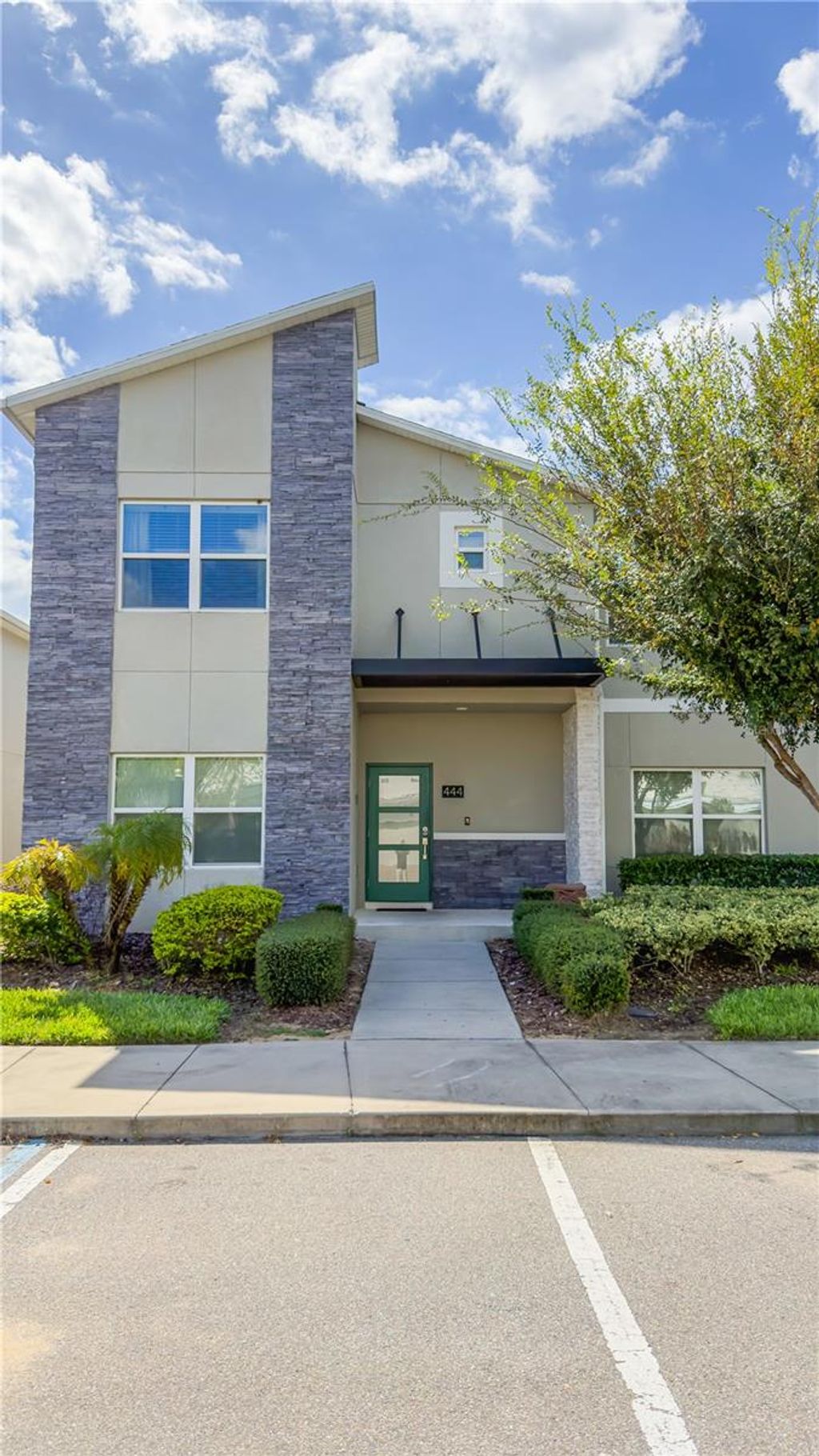 Photo of 444 Ocean Course Avenue, Davenport, FL 33896 (MLS # O6355748)