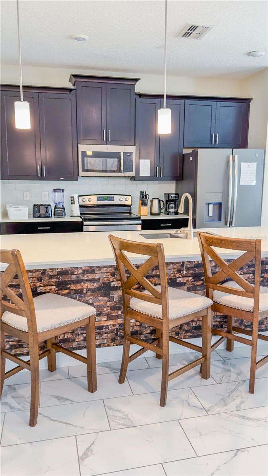 Photo of 444 Ocean Course Avenue, Davenport, FL 33896 (MLS # O6355748)