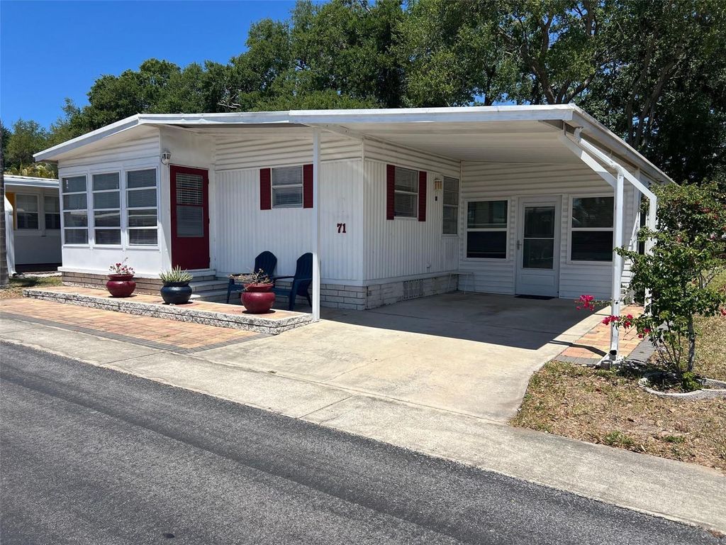Photo of 71 Royal Palm Circle, Largo, FL 33778 (MLS # TB8503346)