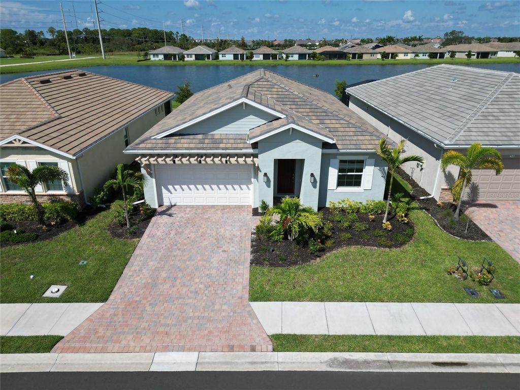 Photo of 419 Ibiza Loop, Venice, FL 34292 (MLS # A4692529)