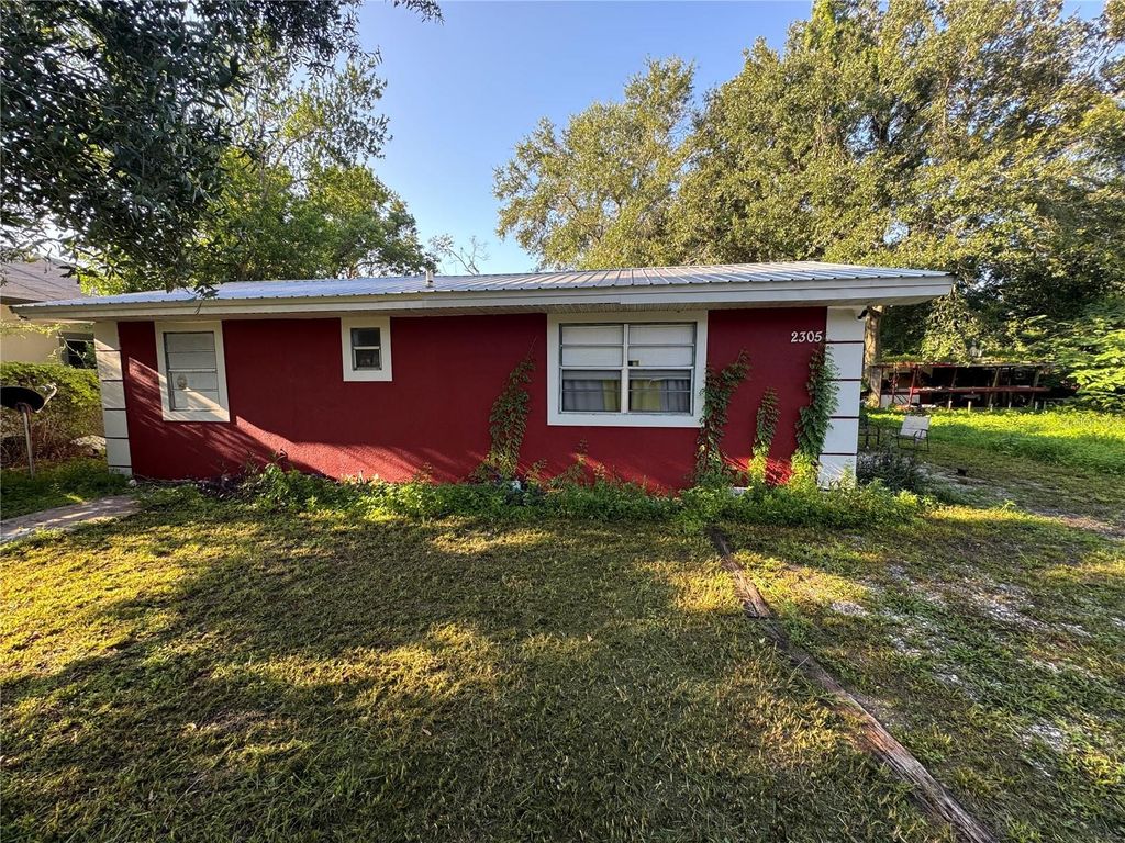 Photo of 2305 E 148th Avenue, Lutz, FL 33549 (MLS # O6343716)