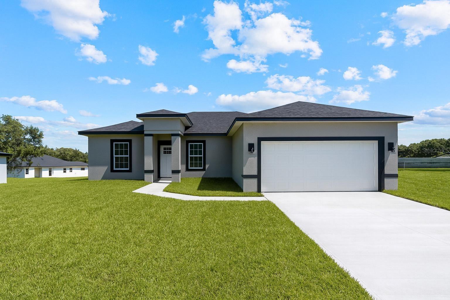 NO HOA!!! NO CDD!! Beautiful BRAND NEW CONSTRUCTION!! 4-Bedroom Home with Open Floorplan in PRIME Ocala Location. Welcome to this stunning brand-new construction 4-bedroom, 2-bathroom home nestled in one of Ocala’s most sought-after neighborhoods. Combining space, style, and privacy, this move-in-ready gem offers exceptional value and timeless appeal — perfect for families, first-time buyers, or anyone seeking comfort and convenience. Step inside to discover a bright, open floorplan that seamlessly connects the living and dining areas — ideal for both everyday living and entertaining. The heart of the home is a beautifully designed kitchen with modern finishes, sleek countertops, ample counter space, and major appliances included, such as refrigerator. Whether you’re hosting dinner or enjoying a quiet night in, this kitchen offers both form and function. The spacious primary suite is a true retreat, filled with natural light and complete with a soaking tub and separate walk-in shower, offering a spa-like experience right at home. The three additional bedrooms are generously sized with built-in closets — perfect for family, guests, or a home office. Throughout the home, you’ll enjoy the elegance of durable vinyl plank flooring, central A/C, and thoughtful details that blend comfort with modern style. Outside, the oversized backyard provides plenty of room to build a pool, making it the perfect setting to enjoy the Florida lifestyle or entertain friends and family. Additional features include: 2 full bathrooms Attached 2-car garage All major kitchen appliances included (refrigerator, oven, dishwasher, microwave) Elegant finishes, beautiful countertops, and modern design throughout. Prime Location: Only 3 minutes by car to the brand-new high school currently under construction. Just 5 minutes by car to shopping, dining, pharmacies, and other conveniences. Easy access to major roadways, putting all of Ocala at your fingertips. Don’t miss this rare opportunity to own a beautiful new construction home in a fantastic location. Schedule your private showing today!