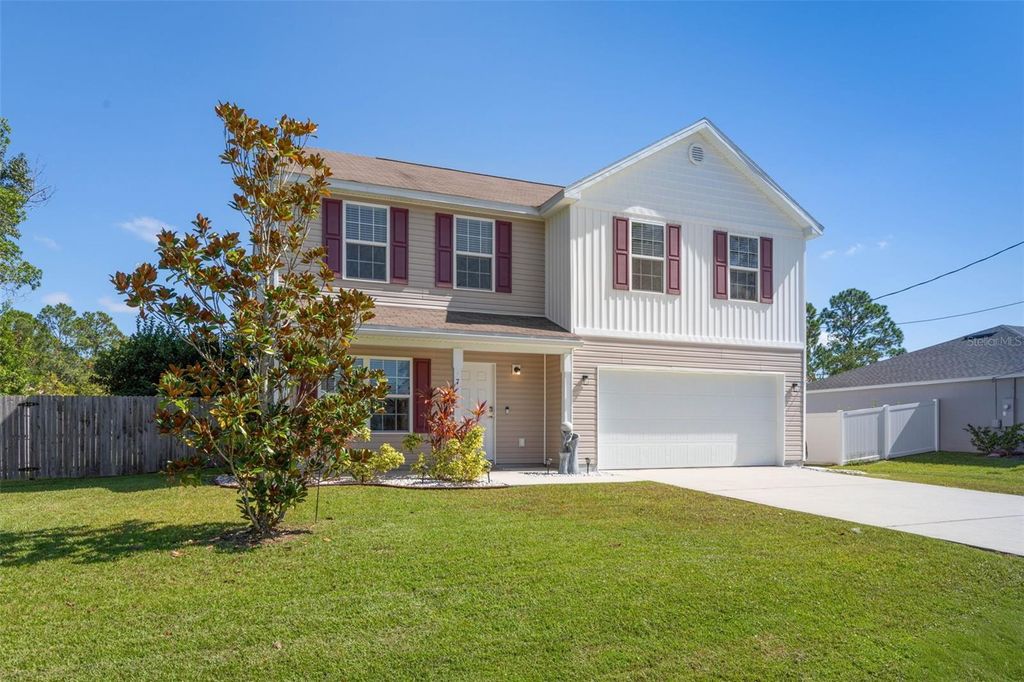 Photo of 7 Russkin Lane, Palm Coast, FL 32164 (MLS # FC313617)