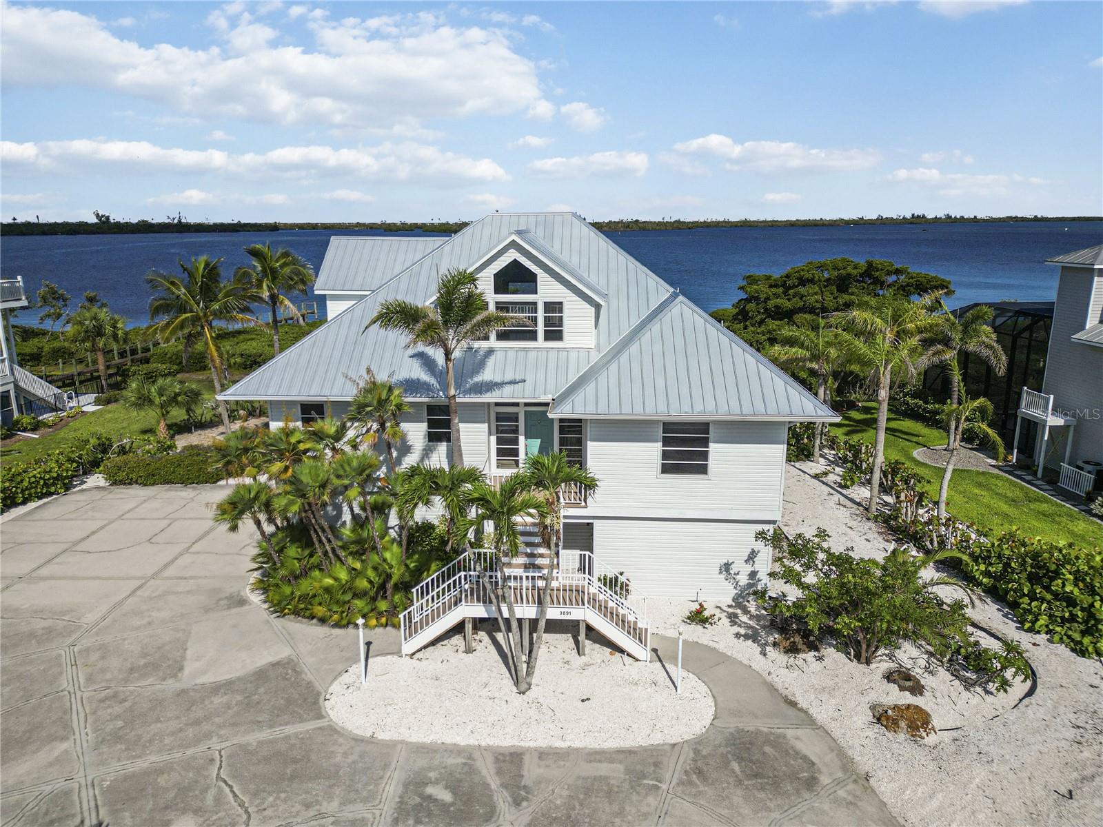 A must see! Located on the Cape Haze Peninsula and buffered from the outside world by the beautiful Lemon Bay Golf Course! Enjoy gorgeous Lemon Bay views and watch magnificent sunsets over Palm Island from nearly all living areas in this 3 bedroom / 2.5 bath pool home.
Minutes away from Boca Grande, pristine beaches, and the Gulf of America.
This 3 story home has so much space and gorgeous views! Tile & wood floors throughout. Kitchen has newer appliances, solid surface counter top. Dining area, living room with pocket sliders that opens up for a panoramic view of the bay. Primary Bedroom has a large balcony over looking the pool area & Bay.
Large 2 car garage with extra 1/2 pool bath, overhead door for golf cart exit/entry, lots of extra space for pool table, ping pong table or any use you prefer. Go fishing or watch sunsets on the extended dock. So much more!
* Dock can accommodate kayaks, jet ski's. Boats dock can accommodate Shallow Draft Boat, (ie Pontoon etc... )
Included in the rent: Pool and landscape service.
Renters Insurance policy required. 100,000 coverage for liability. You may purchased on your own, or it is included in our Resident Benefits Package at a discounted rate, see below.
All PMI Southwest Florida tenants are enrolled in the Resident Benefits Package (RBP) which includes: Resident Liability insurance (optional through this program), 24/7 Maintenance Coordination, Multiple payment options, One-time waiver of trip charge/missed inspection, One-time waiver of late fee, One-time house key replacement; no fobs or mail key and pet screening.
