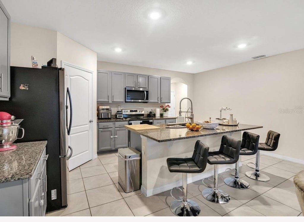 Photo of 5384 Hickory Downs Way, Saint Cloud, FL 34771 (MLS # S5160327)
