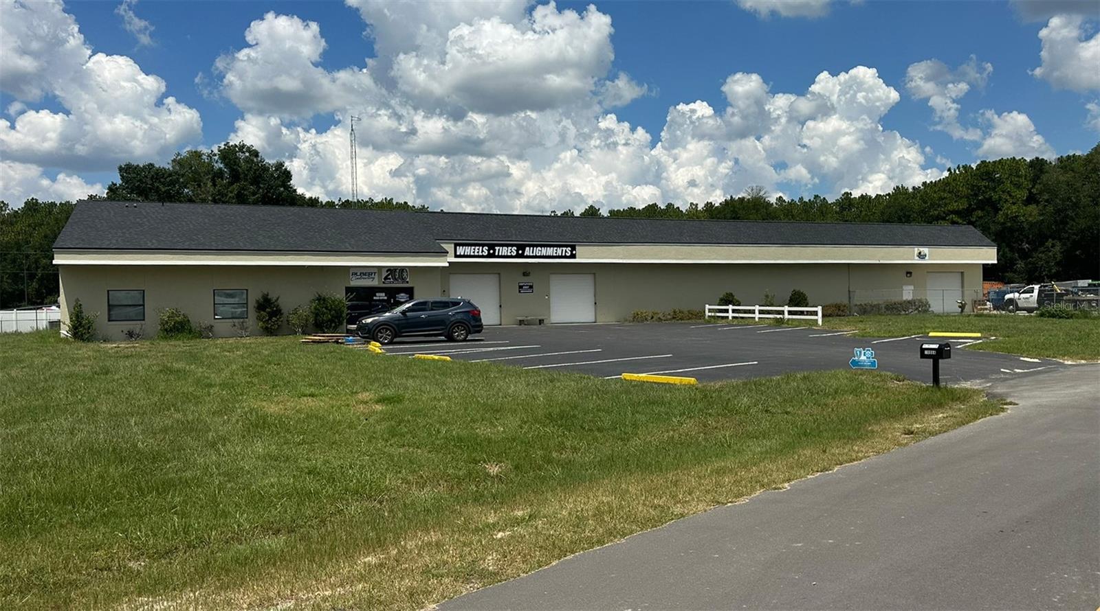 Versatile 11,112 SF concrete block building offering Class A office/showroom space with large warehouse area. Located on .90-acre main parcel with additional .33 acre fenced storage yard included (with its own Parcel ID #). Zoned B-5 and positioned in desirable SW Ocala with close proximity to high-traffic residential areas and high rooftop count. Features include 4 roll-up doors, true covered work area with power, LED warehouse lighting, kitchenette, well, septic (city water/sewer available), and 12 parking spaces. Interior layout includes 6 private offices, reception, waiting area, conference room, and 4 restrooms—one with full shower off executive office and one in the warehouse. Recent upgrades: new roof, new interior/exterior paint, and new toilets and sinks. Ideal for a wide range of business uses.