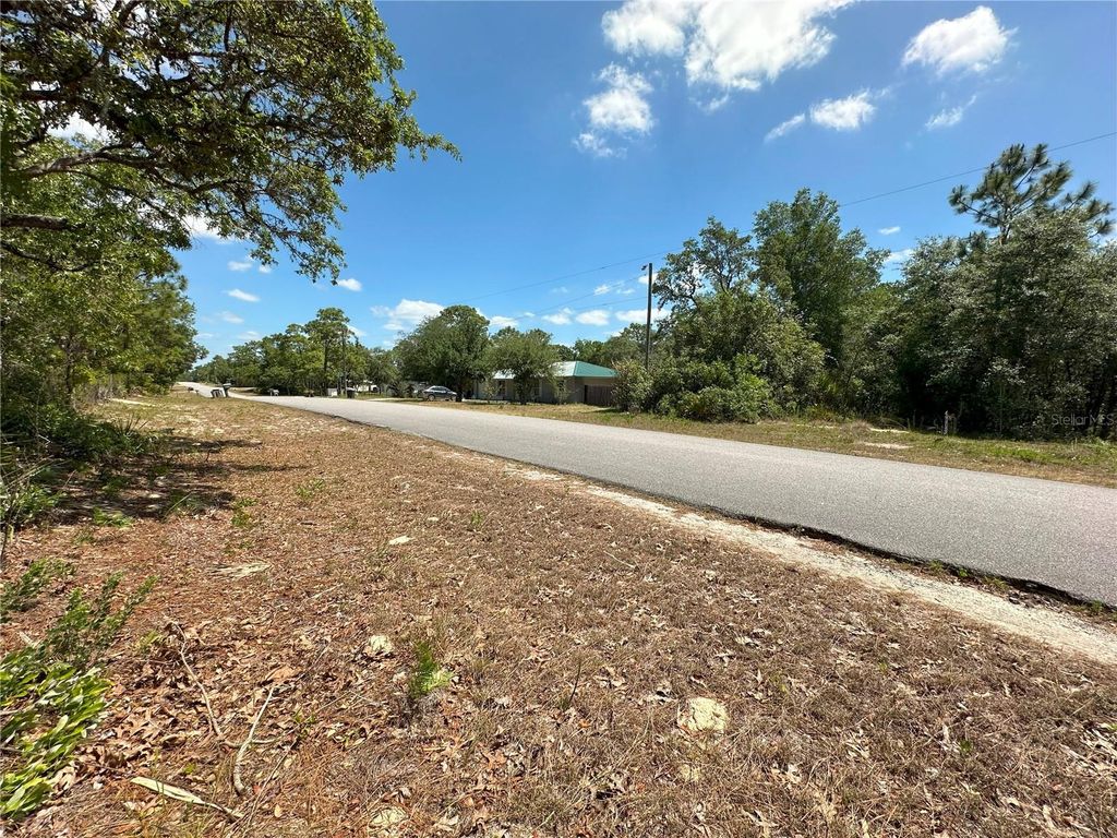 Photo of 671 N Griffith Avenue, Crystal River, FL 34429 (MLS # W7875332)