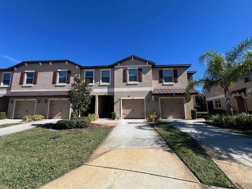WELCOME TO YOUR AMAZING HOME at 8606 Reedville St, New Port Richey in the UPSCALE community of Waters Edge. This LIKE NEW 2022 TOWNHOUSE features 3 bedrooms, 2.5 bathrooms, 1 car garage & WIDE OPEN POND CONSERVATION VIEWS. Enjoy daily wildlife sightings like the resident duck family with ducklings, turkeys, deer & otters. As you step into the expansive foyer, you'll LOVE the ceramic tile floors throughout the entire first level, high ceilings, neutral paint color & LED recessed lighting. The FABULOUS light & bright kitchen features SLEEK stainless steel appliances, granite counters, expansive breakfast bar, MODERN light pendants, BEAUTIFUL shaker-style white wood cabinets with MODERN hardware & pantry closet. NATURAL SUNSHINE streams through the multiple DOUBLE-PANE, THERMAL TINTED, LOW-E windows that can open inward for easy breezy cleaning. The windows are dressed with custom fitted blinds. There is a WHOLE-HOME water softener system. The first level consists of the foyer, kitchen, half-bath, living & dining rooms. The screened lanai with backyard access is off the dining room. The second level consists of the primary bedroom with its private bathroom, 2 more secondary bedrooms with the full bathroom, laundry room & SPACIOUS loft space. The SENSUAL primary bedroom can easily accommodate king-size furniture & has a walk-in closet. The private bathroom features matching cabinet vanity, dual sinks & step-in shower where all your stresses of the day can melt away. In this split bedroom plan, the other 2 bedrooms are located on the opposite side along with the full bathroom with tub/shower combination nearby. MORE MASSIVE BONUSES with this like NEW, MOVE-IN READY HOME: Washer, Dryer & Hurricane Shutters are included. Rent includes all outside lawn/pest maintenance, cable, internet, trash collection twice weekly with recycling & of course, all the PHENOMENAL community amenities. Townhome residents enjoy 2 community pools, gym, fishing pier, dock, playground, walking trails, basketball & pickleball courts & a 9000 sqft clubhouse where you can enjoy planned social activities. Freshly constructed homes like this do not come on the rental market often. MAKE THIS YOUR FUTURE HOME!