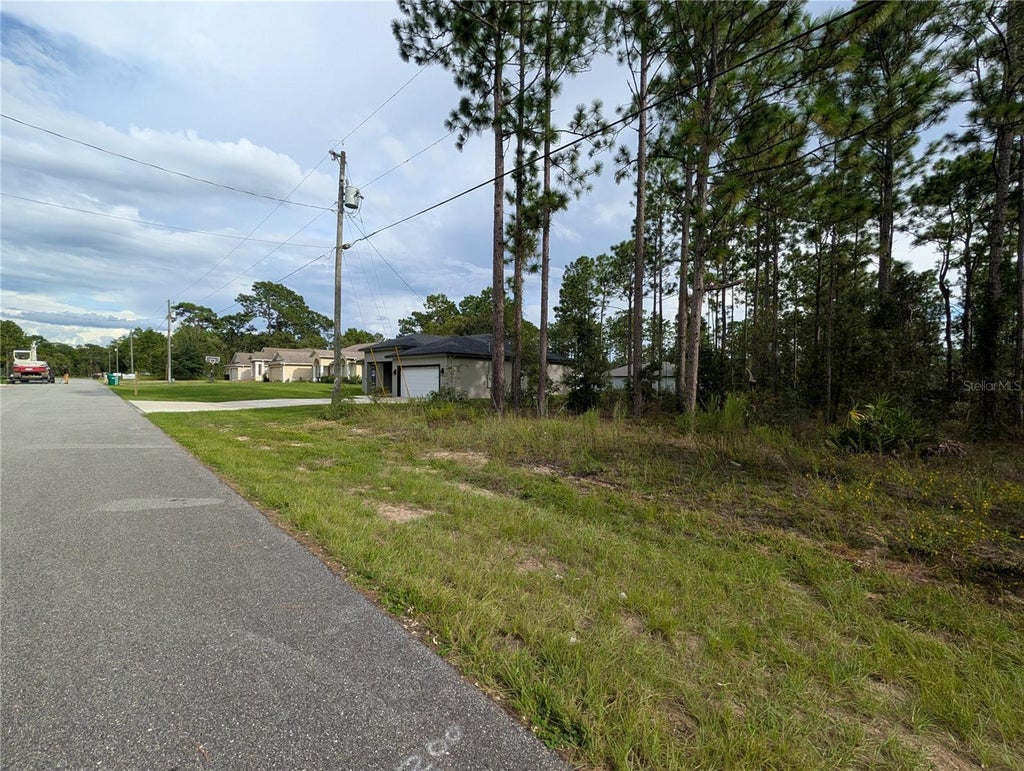 Photo of 640 W Heronsbill Lane, Citrus Springs, FL 34434 (MLS # OM732206)