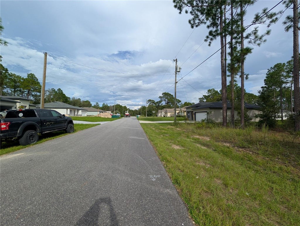Photo of 640 W Heronsbill Lane, Citrus Springs, FL 34434 (MLS # OM732206)