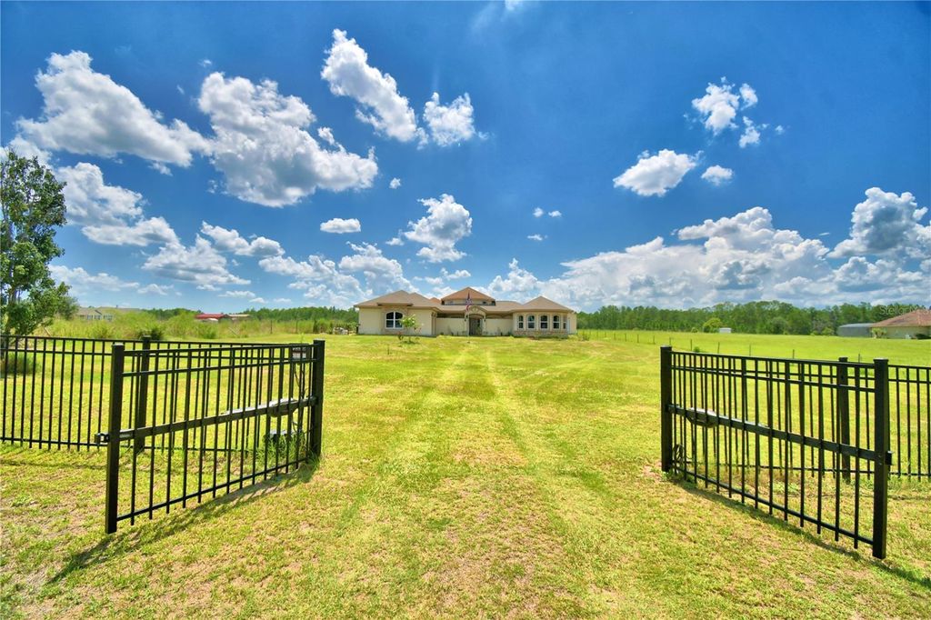 Photo of 13023 Sweet Hill Rd, Polk City, FL 33868 (MLS # G5114211)