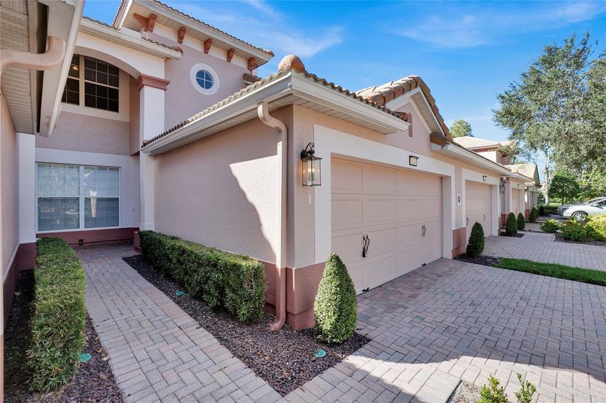 Drive up through your 24-hr. guard gated community entrance to a fully paved driveway with a large 2-car garage. Front door entry is private and well lit.  Large, screened porch 18 x 7 in the rear overlooks a natural area. Oversized and open living room and dining area with a dinette. The kitchen with granite countertops and stainless-steel appliances, with a large walk-in pantry for storage. Kitchen is open to the living dining room area for conversation while cooking with a granite breakfast snack bar. Intricate detail is given with cased moldings on the ceiling in the dining room, and beautiful board-and-batten walls. Board-and-batten dressed beautifully up the staircase wall as well. High ceilings both downstairs and upstairs. Overly spacious master bedroom with tray ceilings overlooks the lush with greenery out back. The ensuite bathroom with double sinks is surprisingly large with stand-up shower, soaking tub and private water closet. Behind the ensuite bath, you will there is 19 ft. long master closet. It could be another room, nursery, hideaway it is that big. There is full bathroom and linen closet on the second floor and convenient half bath downstairs for quests or family. Double ceiling fans help to keep you cool in the summer and the sliding glass wall can be opened during the cool months of the year to allow use as an extra room when entertaining. Your new community affords you the typical Del Webb/Pulte resort-style12,500 Sq Fts clubhouse with numerous amenities, pool with one side beach entry the other entry stairs, room for lap swimming, a Jacuzzi, Pergola seating, pool chairs in the sun, and plenty in the shade. Grilling area with tons of seating an outdoor tv, and bar for meeting up with friends to watch the games while at the pool. The Bocce Ball courts and putting green are just steps away. Inside is coffee station, elegantly designed seating areas to gather, a library, a fireplace, a yoga/exercise room, a complete fitness gym. If you are planning a big party or reception there are also banquet/meeting rooms, ping-pong, brilliantly designed billiards room The locker rooms are waiting when your day of fun is done. All of this is covered in your community fees as well as internet, cable, trash, pest control, and care of the exterior of the property as well as landscaping. This is a one-of-a-kind condo community.  PLEASE NOTE:  Association approval is required.