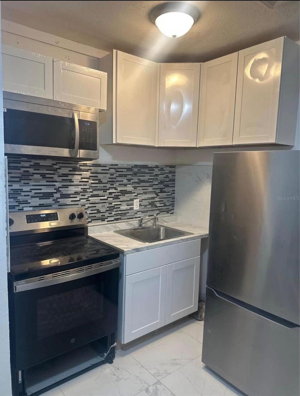 Photo of 820 Galsworthy Avenue, Orlando, FL 32809 (MLS # O6396277)