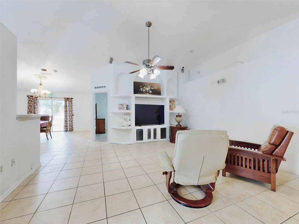 Photo of 185 Winding Cove Ave, Apopka, FL 32703 (MLS # O6418707)