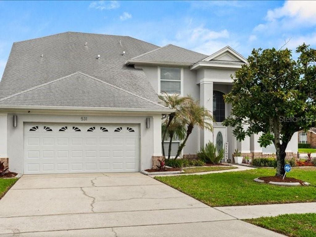 Photo of 531 Terrace Cove Way, Orlando, FL 32828 (MLS # O6394084)