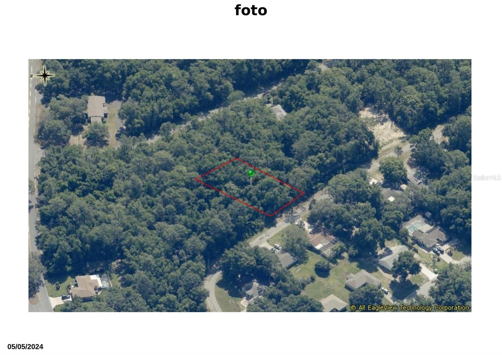 0.44-acre residential lot in Citrus Springs, perfect for building a single-family home. Features access to water and electricity, paved road, and strategic location near the golf course. Quiet, growing community. Excellent investment opportunity!