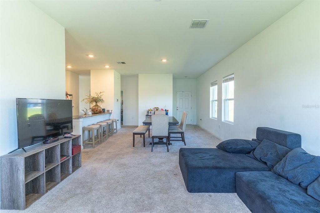 Photo of 436 Hennepin Loop, Lake Wales, FL 33898 (MLS # L4962903)