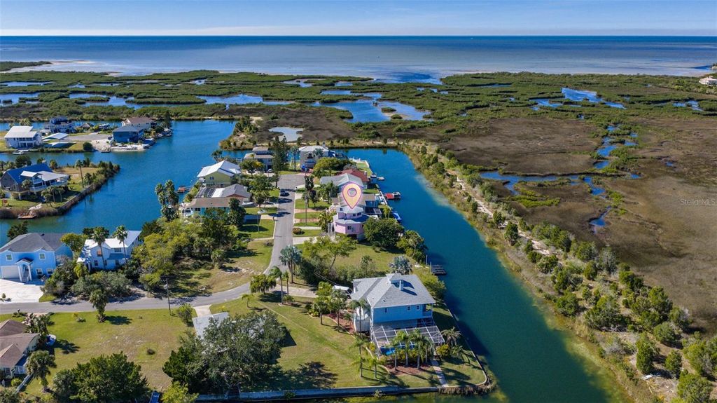 Photo of 3460 Crape Myrtle Drive, Hernando Beach, FL 34607 (MLS # TB8446620)