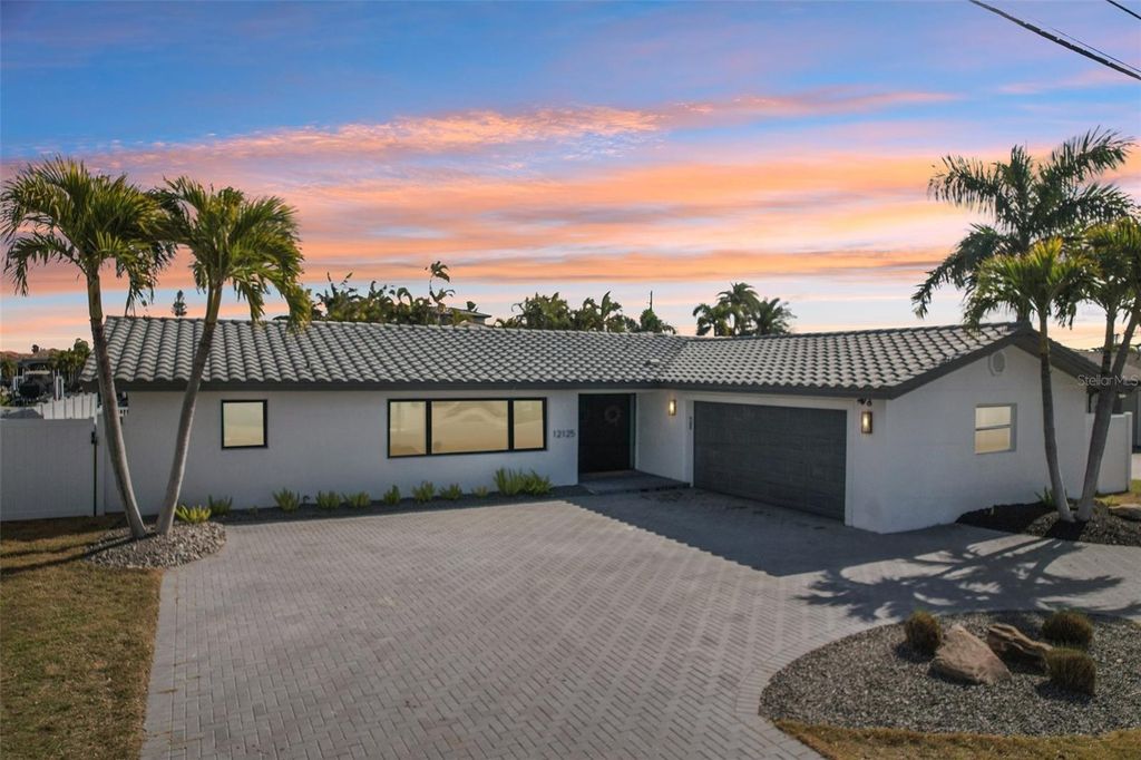 Photo of 12125 5th Street E, Treasure Island, FL 33706 (MLS # TB8475223)