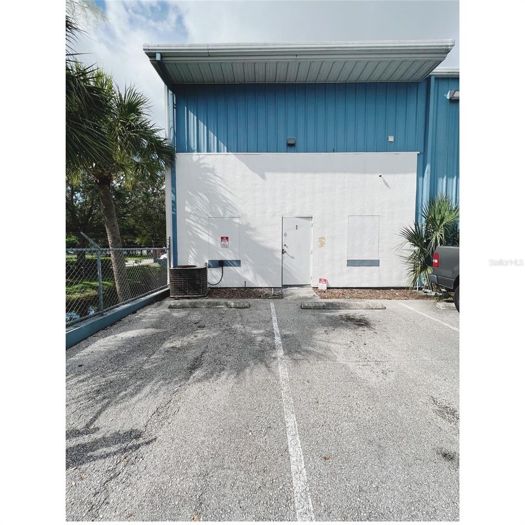 Photo of 7216 Chancery Ln #100, Orlando, FL 32809 (MLS # O6409558)