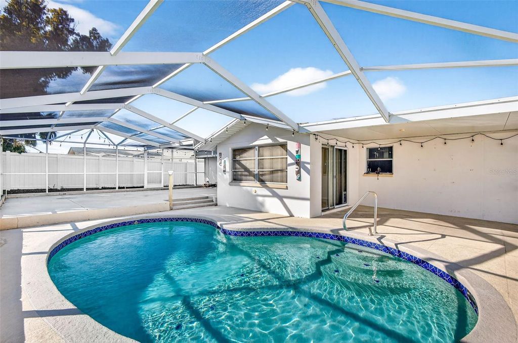 Photo of 8018 Valmy Lane, Port Richey, FL 34668 (MLS # TB8471170)