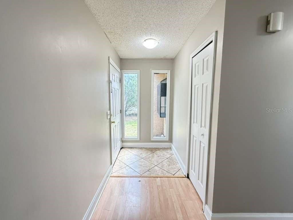 Photo of 118 Dahlia Village Circle #79, Orlando, FL 32807 (MLS # O6388479)