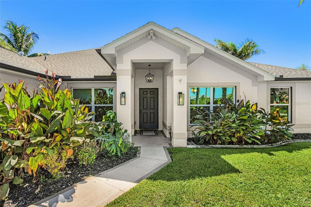 Photo of 3310 NW 5th Terrace, Cape Coral, FL 33993 (MLS # C7531830)