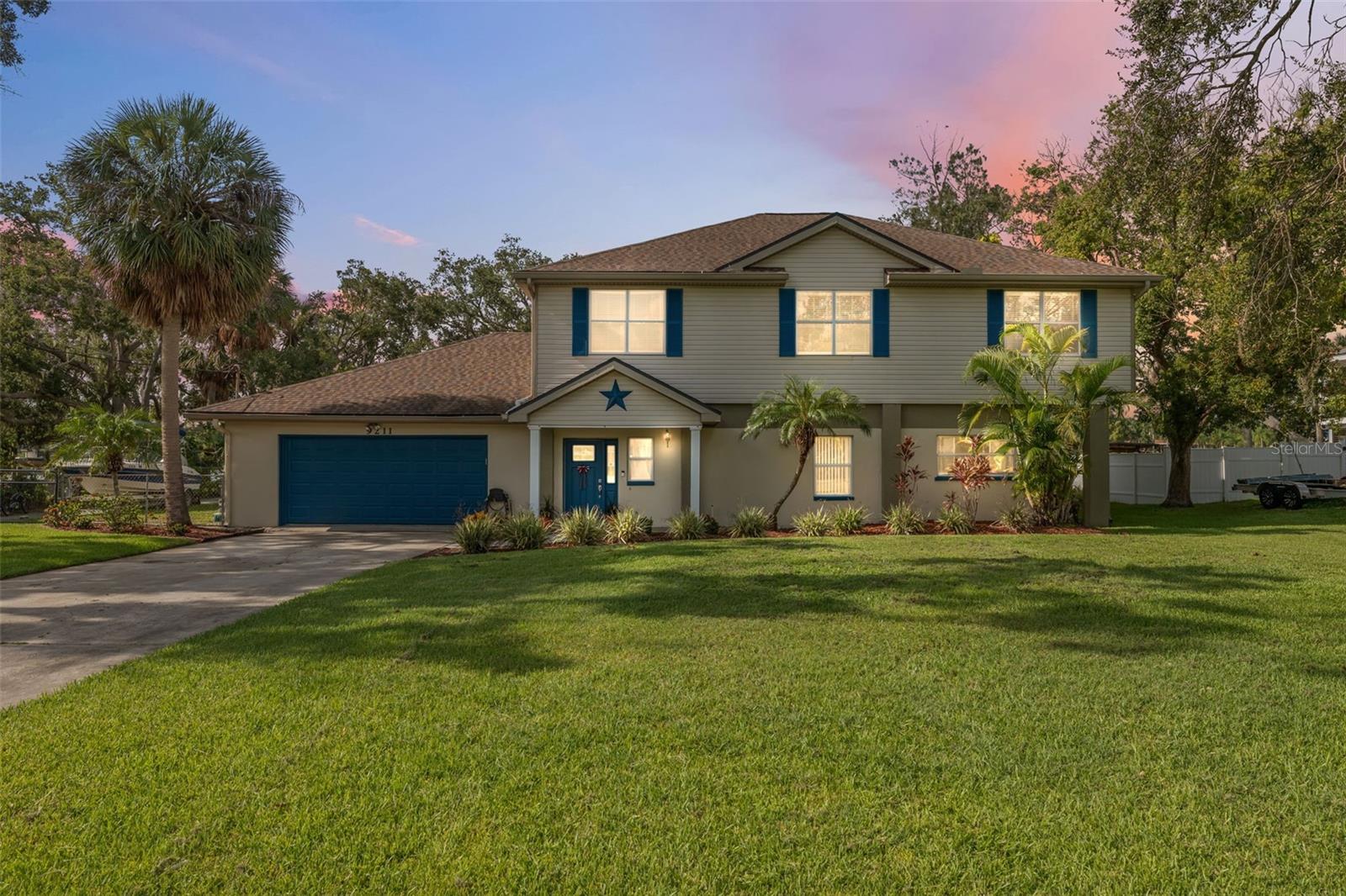 This flexible home can be enjoyed as a spacious single-family residence or as two separate units, perfect for extended family or rental income. The upstairs unit features 3 bedrooms, 2 bathrooms, a cozy fireplace, and a laundry room. The open living area boasts stunning water views of the Alafia River. The downstairs unit has a private entrance, 2 bedrooms, and 2 bathrooms.
The property's best feature is its direct river access, complete with a private boat dock and lift. A two-car garage and ample space for an RV or other recreational vehicles make this home a perfect choice for outdoor enthusiasts. Enjoy the convenience of being close to everything Riverview has to offer, with easy access to major expressways including I-75, the Selmon Expressway, and US-301. This prime location puts you just a short drive from shopping, dining, parks, and entertainment.