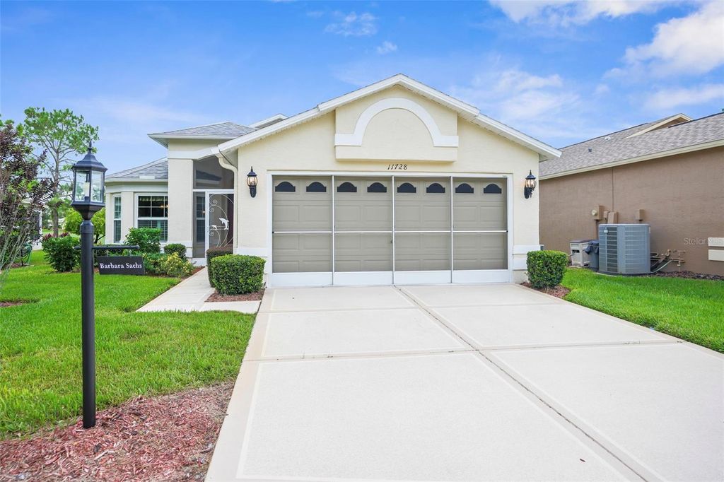 Photo of 11728 Wheatfield Loop, Hudson, FL 34667 (MLS # W7879210)