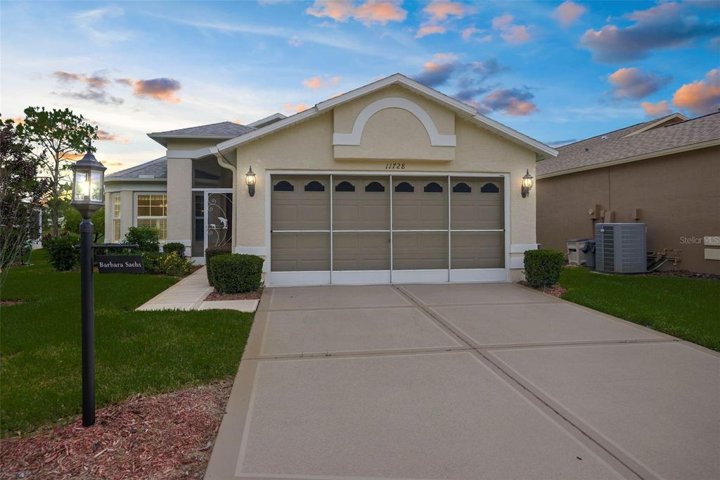 Photo of 11728 Wheatfield Loop, Hudson, FL 34667 (MLS # W7879210)