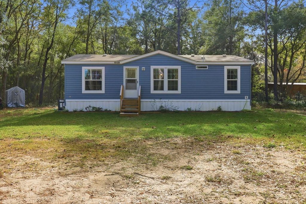 Photo of 19120 SW 49th Place, Dunnellon, FL 34432 (MLS # OM715115)