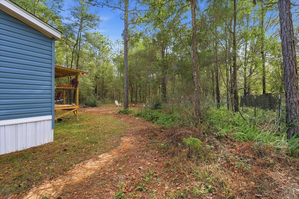 Photo of 19120 SW 49th Place, Dunnellon, FL 34432 (MLS # OM715115)