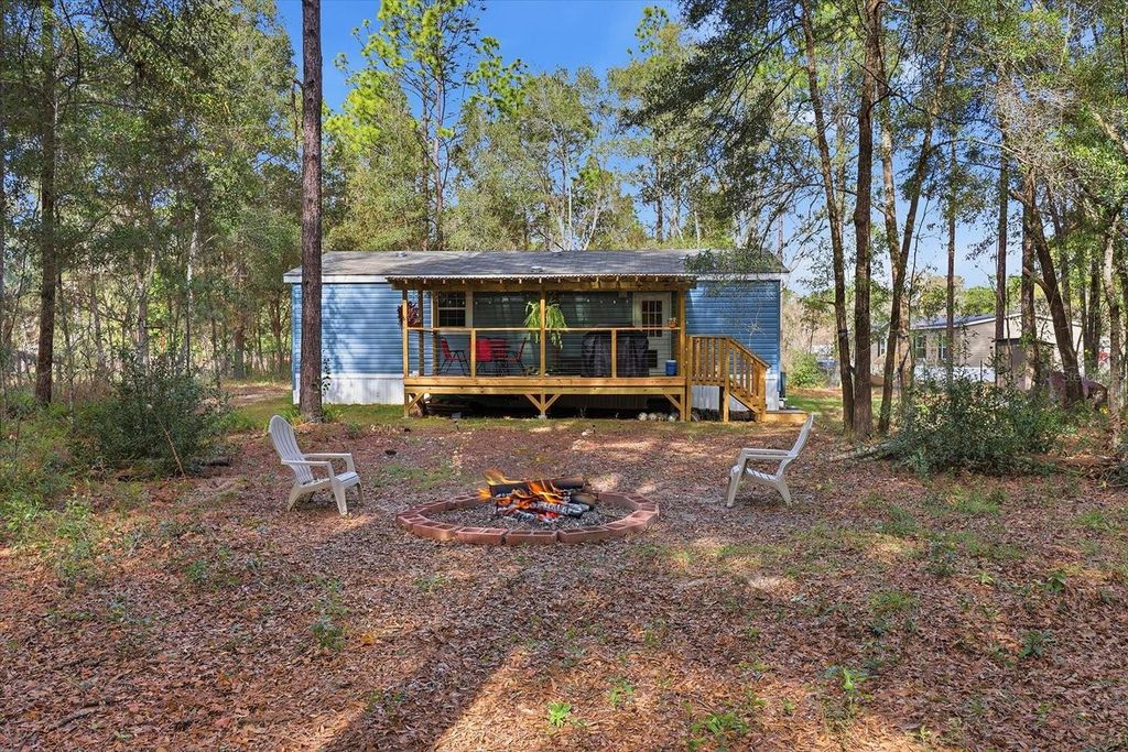 Photo of 19120 SW 49th Place, Dunnellon, FL 34432 (MLS # OM715115)