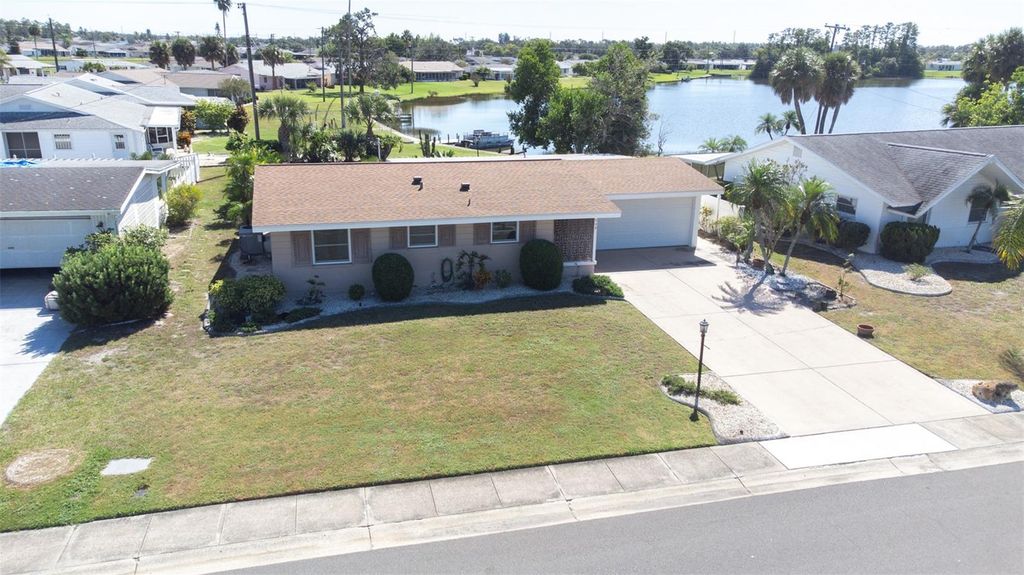 Photo of 1009 Cherry Hills Drive, Sun City Center, FL 33573 (MLS # TB8436639)