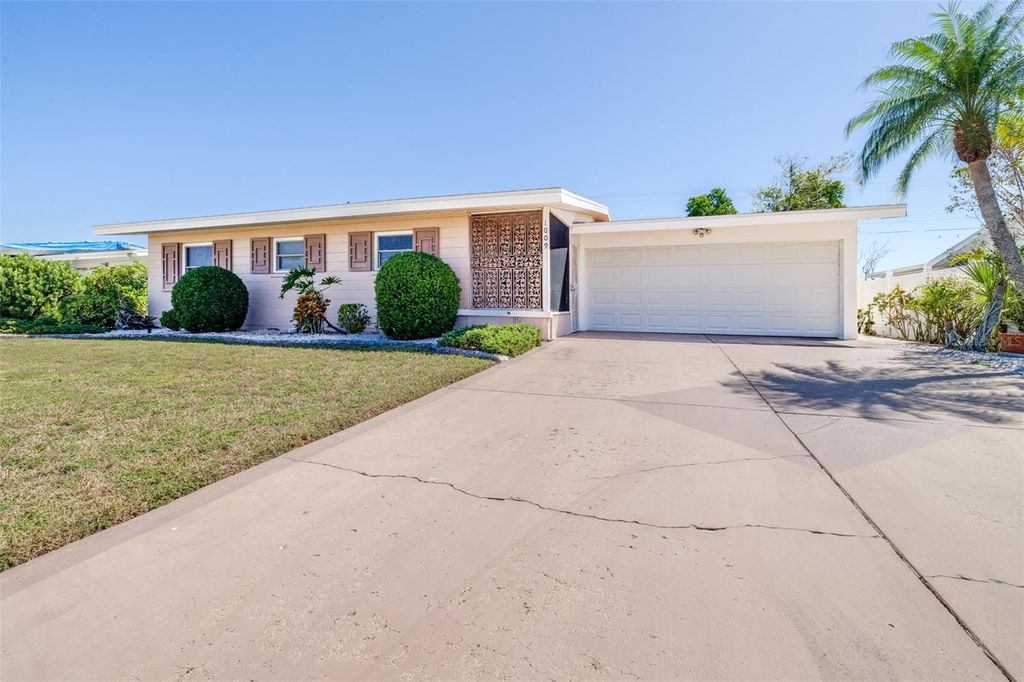 Photo of 1009 Cherry Hills Drive, Sun City Center, FL 33573 (MLS # TB8436639)