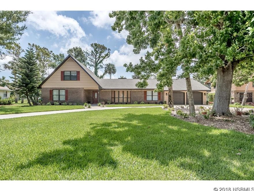 Check out this Beautiful 4 bedroom 3 1/2 bath home is located on the 3rd hole of the New Smyrna Beach Golf Course ''Best Golf Course View''. It has an open concept kitchen with stainless steel appliances, custom tile work and granite counter tops. Master bedroom with private bath downstairs and additional master bedroom upstairs with bathroom and private office. Formal dining room opens up to spacious living room with bay window, family room is open to the kitchen and has a wood burning fireplace. Oversized 2 car garage has plenty of storage and room for a golf cart. Extras include full laundry room, new laminate and tile floors, screened porch, fire pit, wood deck and gazebo..  Great for Entertaining. House has new roof and was painted in the last year. All appliances are only 3 years old. Large back yard overlooking the golf course. Close to Canal Street, minutes to Flagler Ave. and the beach. Beautiful established neighborhood. If you love to golf there?s two golf courses to choose from ? this house is sitting on the 2nd tee of the New Smyrna Beach Golf Course and the club house for Hidden Lakes Golf Course is just down the street (5 minute walk). If you?re not a golfer, you?ll still feel right at home in this quiet neighborhood ;Water: City