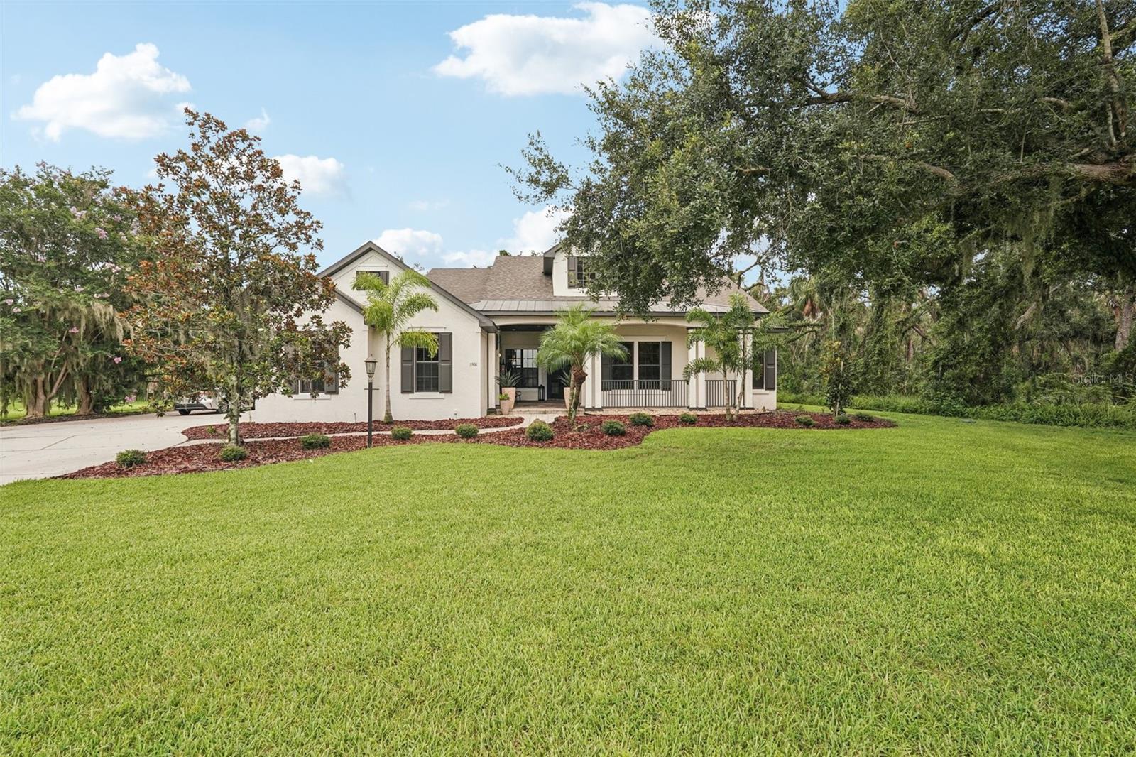 Welcome to this Former Model Showstopper, a custom-built Arthur Rutenberg home that’s truly one-of-a-kind! This stunning residence features 5 bedrooms, 3 bathrooms, Office, Bonus Room, and a beautiful Pool and Spa, all situated on over an acre of land. The home boasts exquisite details throughout, including a Remodeled Gourmet kitchen equipped with gorgeous Quartz countertops and Island, all-new fixtures and lighting, and a high-end induction cooktop. The light-colored real Wood Cabinets with soft-close drawers and doors add a touch of elegance. Among the many amazing features, you’ll find a charming stone fireplace, wood inlaid ceilings, Tray Ceilings, Custom Built Ins and beautiful Wood flooring, creating a warm and inviting atmosphere. This spectacular home offers plenty of fabulous living space, perfect for entertaining friends and family. The spacious Master Bedroom includes an oversized walk-in closet, providing ample storage. The bonus room, complete with built-ins, is perfect for an office or play space. Guest bedroom features a walk in Closet. Surrounded by beautiful trees, this home offers a high degree of privacy. Enjoy the expansive extended Lanai featuring an Outdoor Kitchen, perfect for entertaining, along with an oversized pool and spa for relaxation. As part of the Twin Rivers community, you'll enjoy private boat access to the river, along with basketball, volleyball, and soccer fields. With beautiful nature walking trails, low HOA fees, and no CDDs, this remarkable home is the perfect place to enjoy a peaceful and active lifestyle. Don’t miss out on the opportunity to make this exquisite home your own!