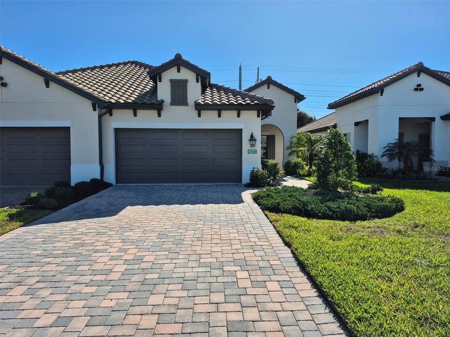 The Tidewinds model is a spacious two bedroom villa home designed by Neal Communities. Enjoy entertaining your guests in the well equipped villa with large kitchen island and walk-in pantry. A generous living area that includes a breakfast/dining nook and pocket glass doors that open up to the lanai. Retreat to your master bedroom with ensuite bathroom, walk-in shower, double sinks, and two large walk-in closets. This villa boasts 8ft interior doors for that open feel.
