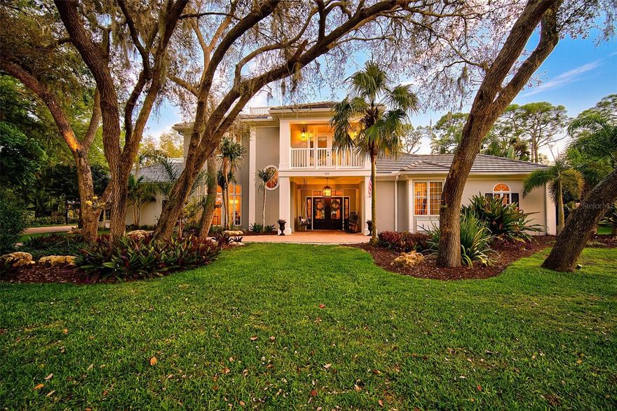 **STUNNINGLY UPDATED, CUSTOM GOLF COURSE ESTATE on a SPECTACULAR, Stand Alone, Beautifully Landscaped Lot with GOLF and LAKE VIEW ** is located behind the Secure Gates of The Oaks Country Club neighborhood and overlooks the Interior HERON COURSE.  Featuring 5 BEDROOMS (including 4 En Suite), 4 FULL and 2 HALF BATHS, this Light and Bright, Open and Split floorplan is ideal for entertaining both inside and out with walls of windows and beautiful French Doors throughout!  The Impressive NEW Kitchen features Quartz Counters, Stainless Steel appliances, Large Island with sitting area, a walk-in Pantry, etc.  The new Tile (wood look) floors complement the abundant architectural details including wainscoting, ship lap, crown molding, many built-ins, and much more!  The Expansive Primary Bedroom Suite entails a walk-in closet with custom built-ins and spacious bath with dual vanities, custom tiled shower and soaking tub while the 2nd story bedrooms feature private balconies PLUS a Bonus room and built-in desk area. Incredible, BRAND NEW Outdoor Entertaining area features a magnificent Pool & Spa with Fountains, travertine pool deck, Panoramic Screen Enclosure with LED lighting elements PLUS a Cabana style, covered entertaining area, Outdoor Kitchen and Pool Bath.  NEW(er) ROOF (2018) and HVAC (2020-2021).  THE OAKS is a distinguished, 24hr Guarded, Country Club Community which boasts many accolades including: Platinum Club of America, Emerald Club of the World and Elite Distinguished Club of the World - where amenities include Two, 18-hole Championship GOLF courses, Award-Winning TENNIS program with 12 har-tru hydro-grid tennis courts, 4 PICKLEBALL courts, state-of-the-art FITNESS center and junior Olympic, heated community SWIMMING POOL. THE OAKS is just minutes from nationally ranked Pine View School, the Legacy Bike Trail, Area Beaches and all that Gulf Coast living has to offer. Membership is required and there is NO WAITLIST for GOLF or Social Membership.   **ENJOY THE 3D VIRTUAL TOUR and AERIAL VIDEO**