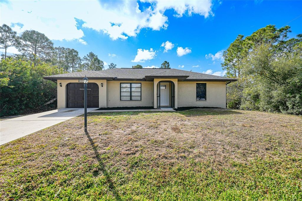 Photo of 23211 Adela Avenue, Port Charlotte, FL 33952 (MLS # C7519936)