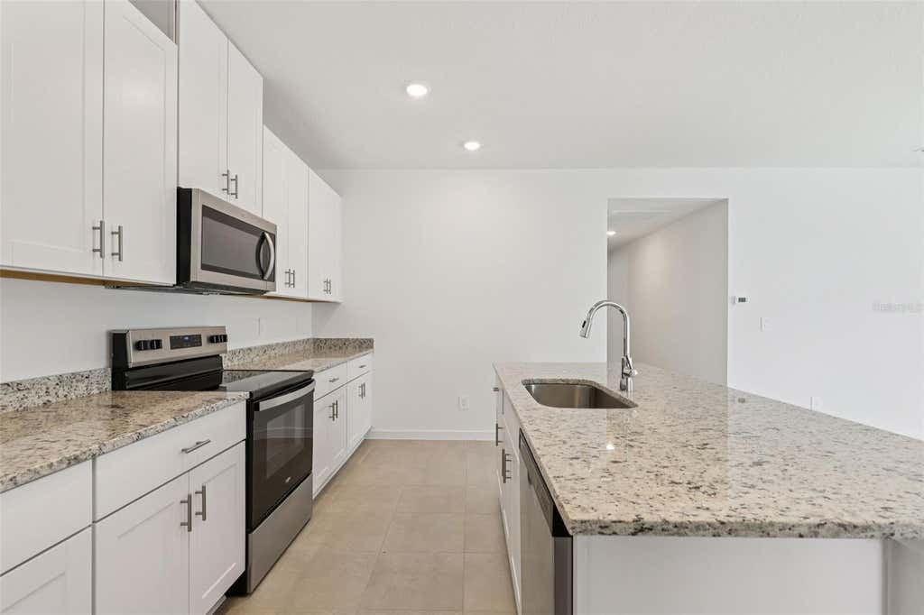 Photo of 81 Wandering Creek Way, Palm Coast, FL 32164 (MLS # TB8541087)