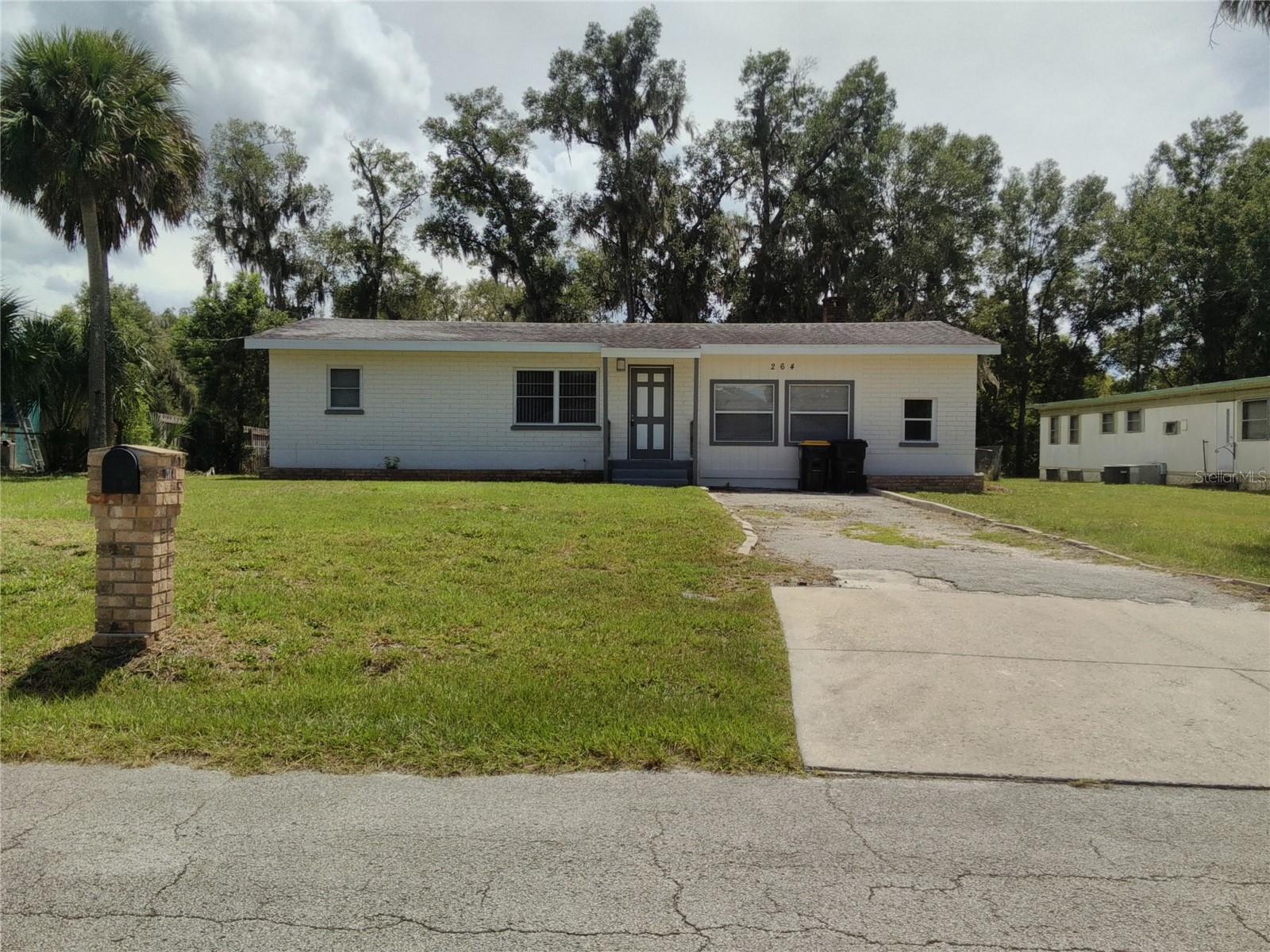 Nice & Clean Orange City Rental in an established neighborhood!! Recently Renovated & it pops with upgrades!! Brand New Kitchen with New Appliances · New Flooring Throughout (wide plank luxury vinyl & carpet) · New Bath Vanities & Commodes · New Paint in & out · New Window Blinds · PLUS the lists goes on!!! Concrete block home with (2) Bedrooms, (2) Full Baths, living room, family room with fireplace, large utility, and all this sits on an 80x175 lot!! HURRY! WON'T LAST! A MUST SEE! NO APPLICATION FEE! Possible SMALL pet friendly. Please note: Applicant(s) must have a minimum monthly income of $5,000 to quality. CALL TODAY!
