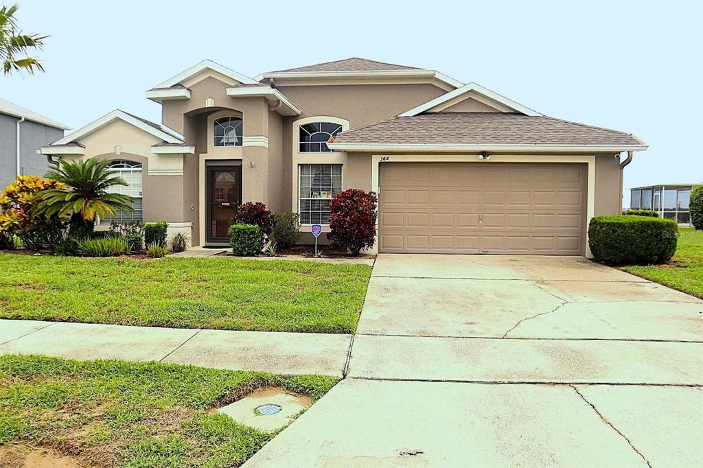 Photo of 364 Lockbreeze Dr, Davenport, FL 33897 (MLS # O6337459)