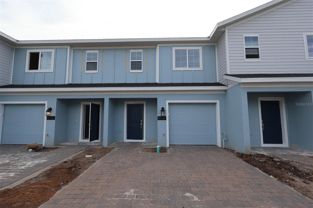 Photo of 6108 Fellow Wagon Way, Orlando, FL 32822 (MLS # O6434118)