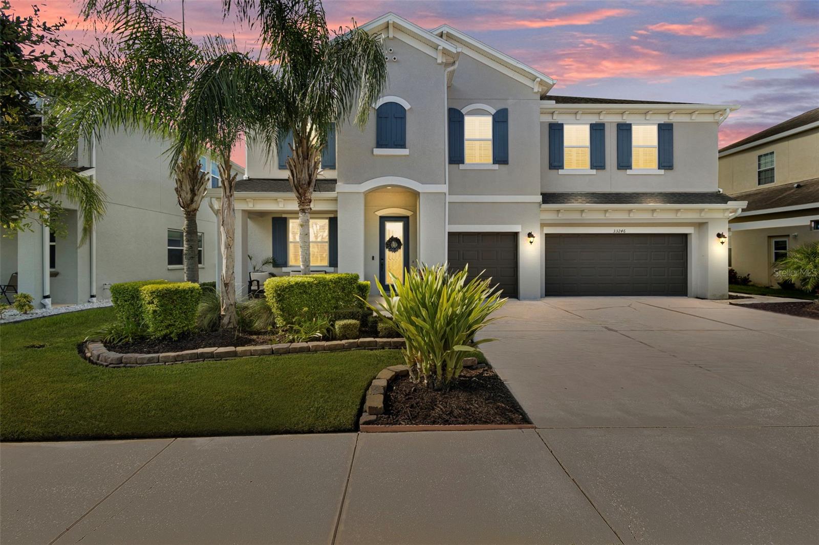 This 5-bedroom, 3.5-bath, 3 car garage POOL home in the gated Cypress Bend at Watergrass neighborhood delivers where it counts—starting with a backyard you’ll fall in love with. Whether you're hosting the whole crew or enjoying a quiet night under the stars, the heated saltwater pool, in-ground oversized spa, and spacious screened-in patio with Shellock pavers set the scene. There’s no rear neighbor, just a peaceful backdrop and upgraded landscaping that adds both beauty and privacy. It’s Florida living at its finest.
Inside, the layout is just as impressive. Plantation shutters throughout the home add a clean, timeless feel, and upgraded tile flooring runs across the first floor. A flexible den with French doors sits just off the entry—perfect for a home office or cozy lounge.
The open-concept main living area is the heart of the home. The kitchen wows with a massive island, white stylish cabinets, stainless KitchenAid appliances, and plenty of storage. It flows effortlessly into the dining and living spaces, where a stone accent wall, tray ceiling, and recessed lighting bring warmth and character. There’s also a casual eat-in space that opens right to the lanai—seamlessly blending indoor and outdoor living.
The first-floor primary suite offers great space and pool views, along with a spa-like ensuite bath featuring dual vanities, a soaking tub, frameless glass shower, and a walk-in closet. A powder bath and laundry room round out the downstairs.
Head upstairs and you’ll find four more bedrooms, two full baths, and a huge loft—perfect for movie nights, game room, playroom, or whatever fits your lifestyle. Two bedrooms share a Jack-and-Jill bath; the others are served by a hall bath with easy access from the loft.
All of this is located in the gated Cypress Bend at Watergrass community loaded with amenities: resort-style pools, clubhouse, gym, playgrounds, tennis courts, and more. Plus enjoy a playground and basketball court directly across the street from your home! You're just minutes from Wiregrass Mall, the Epperson Lagoon, and Wesley Chapel’s best shopping and dining. Downtown Tampa and the airport are an easy drive—less than 30 minutes away.
Need space? Love to entertain? This is the kind of home you don’t want to miss